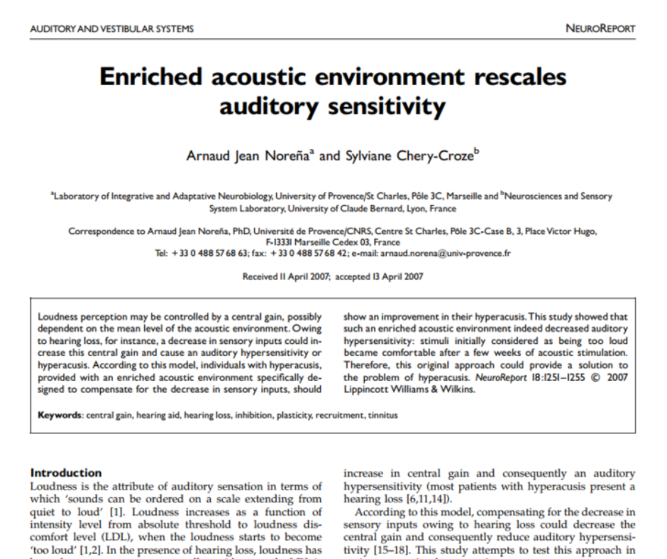 Enriched acoustic environment rescales auditory sensitivity